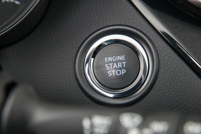 Toyota to roll out automatic engine shutoff, automatic park safety features
