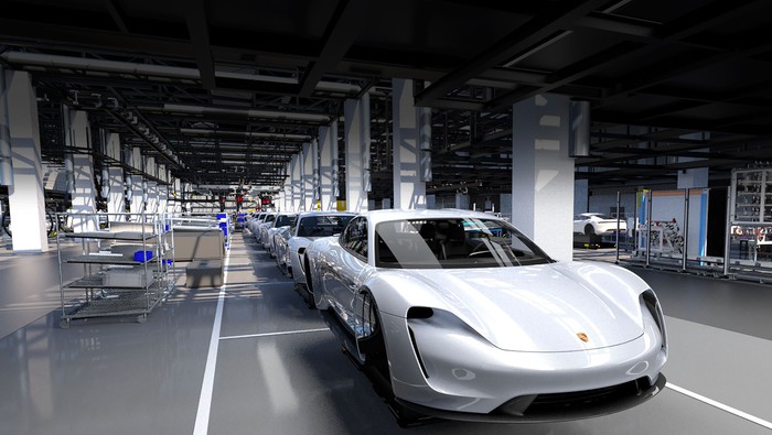 Porsche Taycans ride on autonomous robots during assembly