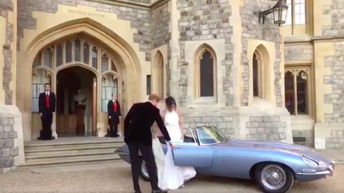 Prince Harry and Meghan Markle leave wedding in Jaguar E-Type 0