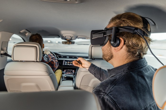 Audi's backseat VR tech syncs virtual world with vehicle's movement