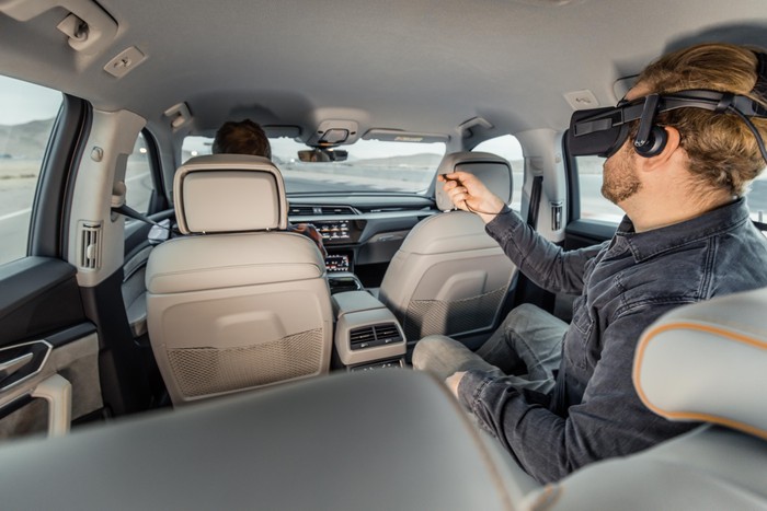 Audi's backseat VR tech syncs virtual world with vehicle's movement