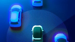 Illustration of self-driving cars utilizing a decentralized learning network to share real-time data.