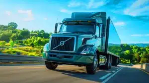 Illustration of Volvo's innovative stop/start engine technology for heavy-duty trucks enhancing fuel efficiency and sustainability.