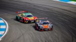 Thrilling auto race captured at Hockenheim Circuit, showcasing high-speed competition.