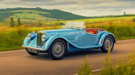 Illustration of the Austin Arrow Roadster EV with its retro-inspired design and electric vehicle technology.