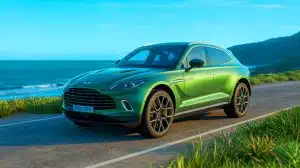 Illustration of the 2026 Aston Martin DBX S luxury SUV, showcasing its sleek design and powerful performance.