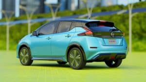Illustration of the 2026 Nissan LEAF, a crossover SUV with enhanced range and affordability.