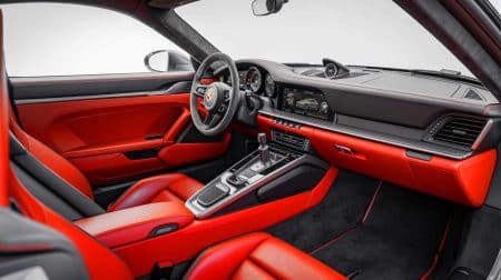 Illustration of the 2026 Porsche 911 Turbo S interior showcasing luxurious design and advanced technology.