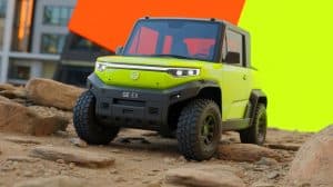 Illustration of the GEM eX electric utility vehicle designed for both urban and rugged terrains.