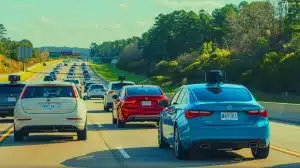 Illustration of drivers adhering to the Hands Free Law to ensure road safety.