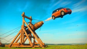 Illustration of a medieval trebuchet launching a Mini Cooper into the sky.